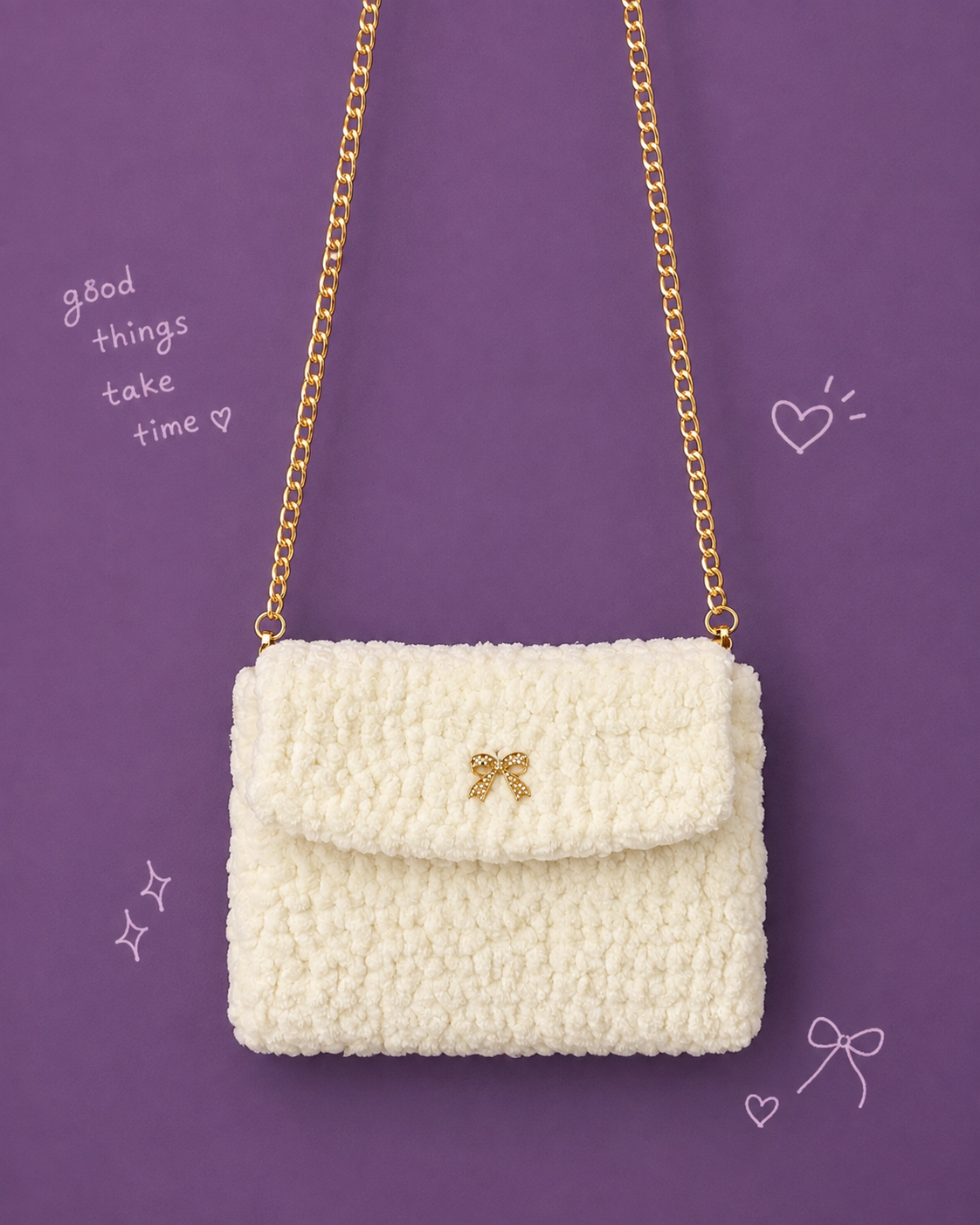 Cream chenille crochet clutch bag with gold chain and rhinestone bow charm