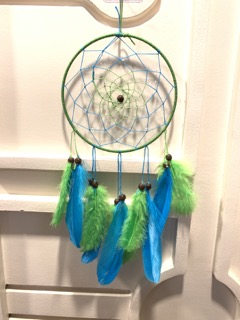 Small green-rimmed dream catcher with blue and green feathers
