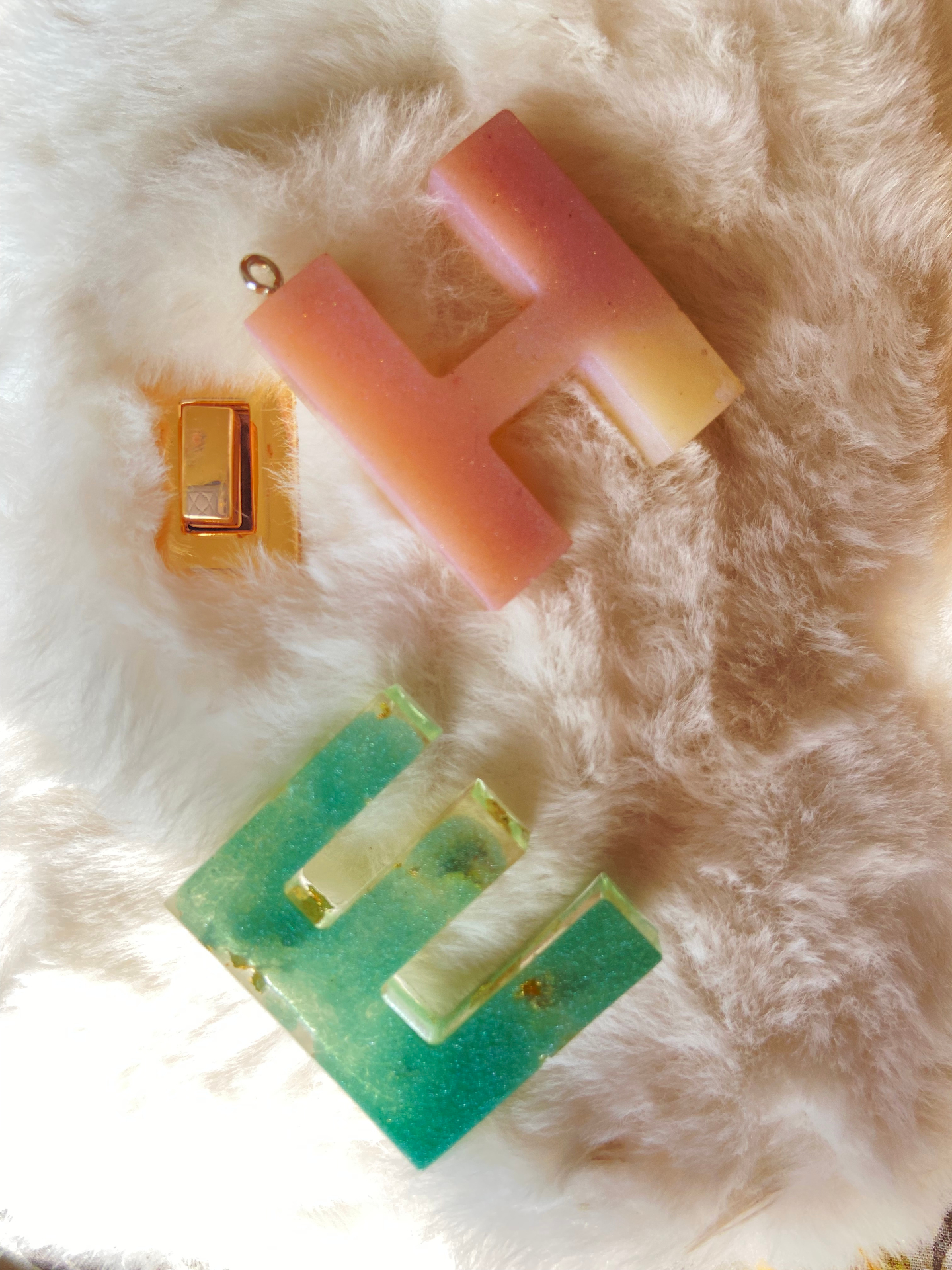 Resin initial keychains — pink H and mint green E